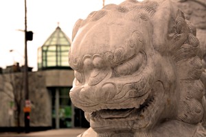 One of the Chinatown stone lion statues